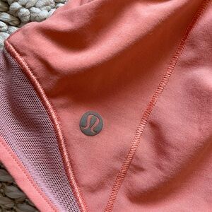 Coral Lululemon hotty hot low rise shorts 2.5”